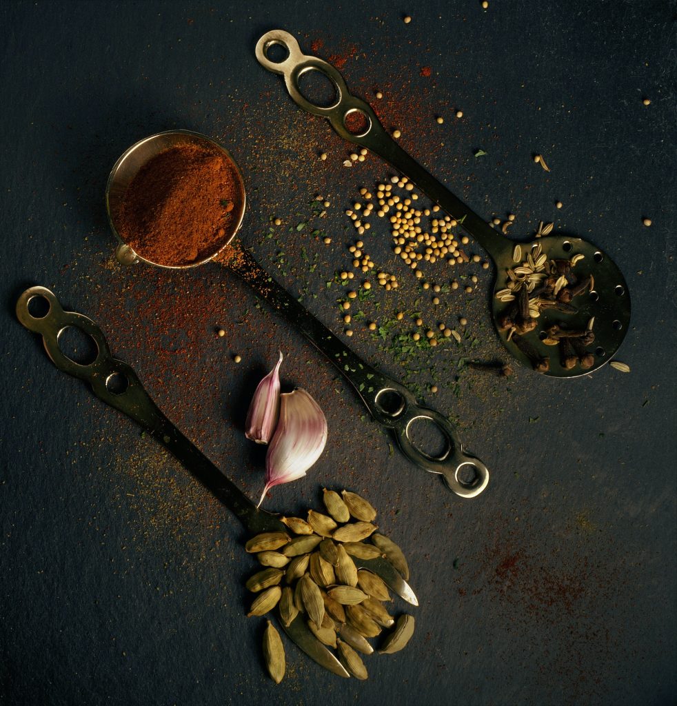 Spices on steel ladles